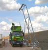 Mobile fall arrest and lorry sheeting gantry in use at land fill site 