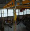 Multiple rail mounted overhead fall arrest systems in aircraft hanger